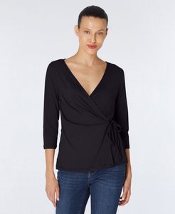 Inner Beauty Solid 3/4 Sleeve Surplice Front V-Neck Top offers at $40.95 in Stein Mart