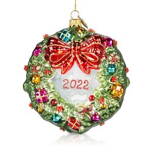 Pier 1 Wreath with Presents Glass Christmas Ornament offers at $59.95 in Stein Mart