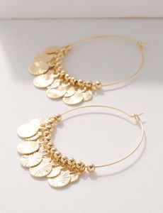 Discs Beads Hoop Earrings offers at $29.65 in Stein Mart