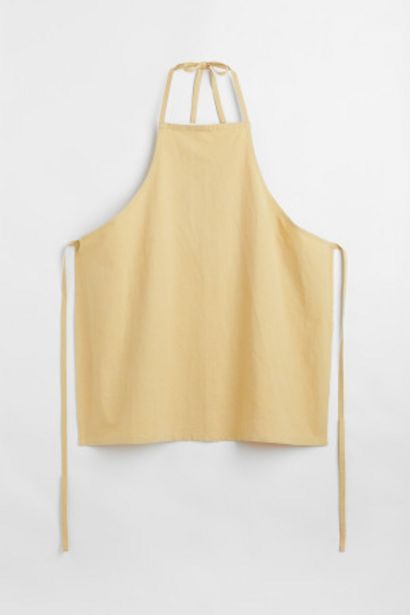 Plant-dyed Cotton Apron offers at $10.99 in H&M