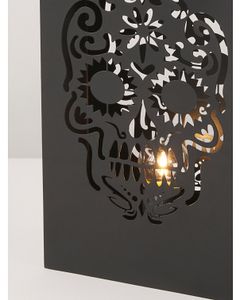 13in Metal Sugar Skull Cutout Uplight offers at $15 in Home Goods