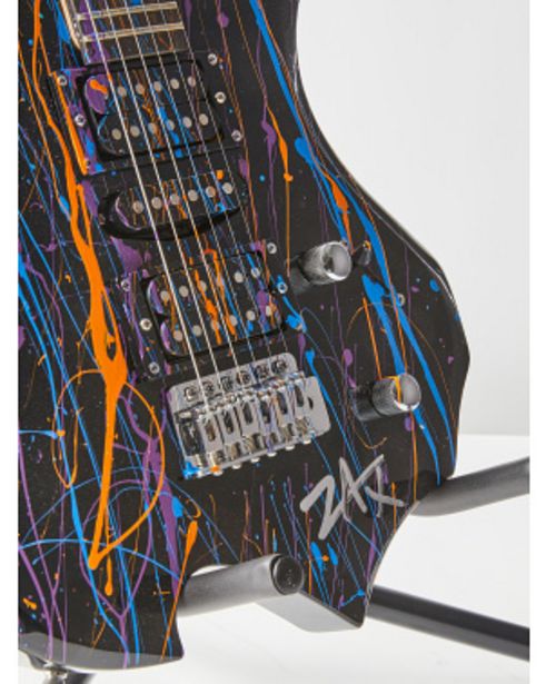 48in Hand Painted Guitar And Stand offers at $234 in Home Goods