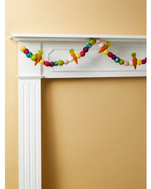 6ft Pom Pom Carrot Garland offers at $7 in Home Goods