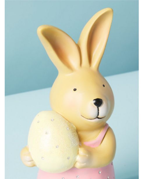 9in Ceramic Bunny Holding Egg Figurine offers at $7 in Home Goods