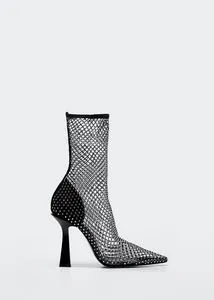 Mesh heel ankle boots offers at $59.99 in Mango