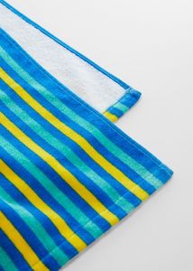 Multi-colored striped beach towel offers at $49.99 in Mango