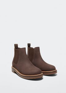 Leather ankle boots offers at $35.99 in Mango