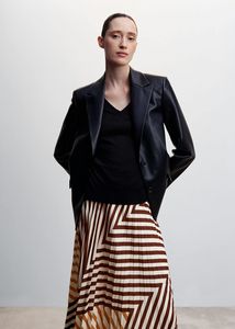 Printed pleated skirt offers at $49.99 in Mango