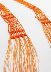 Fine scarf with crystal beads offers at $25.99 in Mango