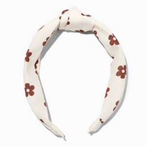 Ivory Groovy Brown Daisy Knotted Headband offers at $8.99 in Claire's