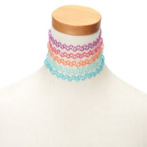 Summer Tattoo Choker Necklaces (5 Pack) offers at $6.49 in Claire's