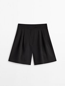 Long Bermuda Shorts With Darts offers at $199 in Massimo Dutti